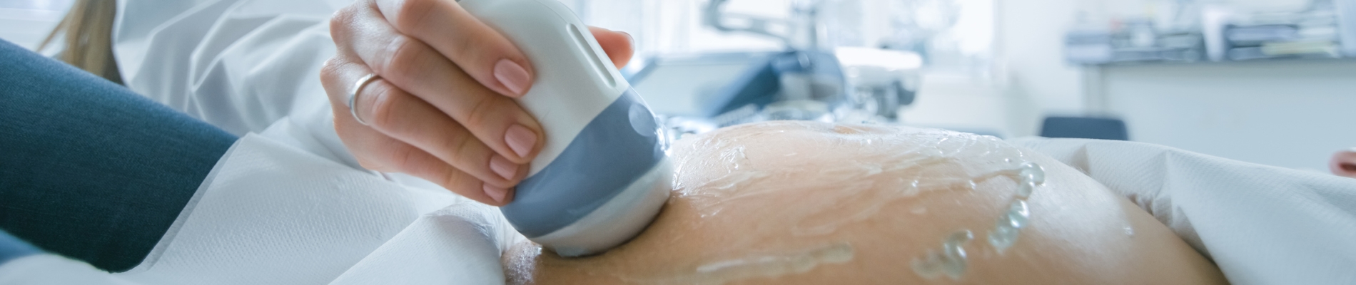 ultrasound being performed on a pregnant woman