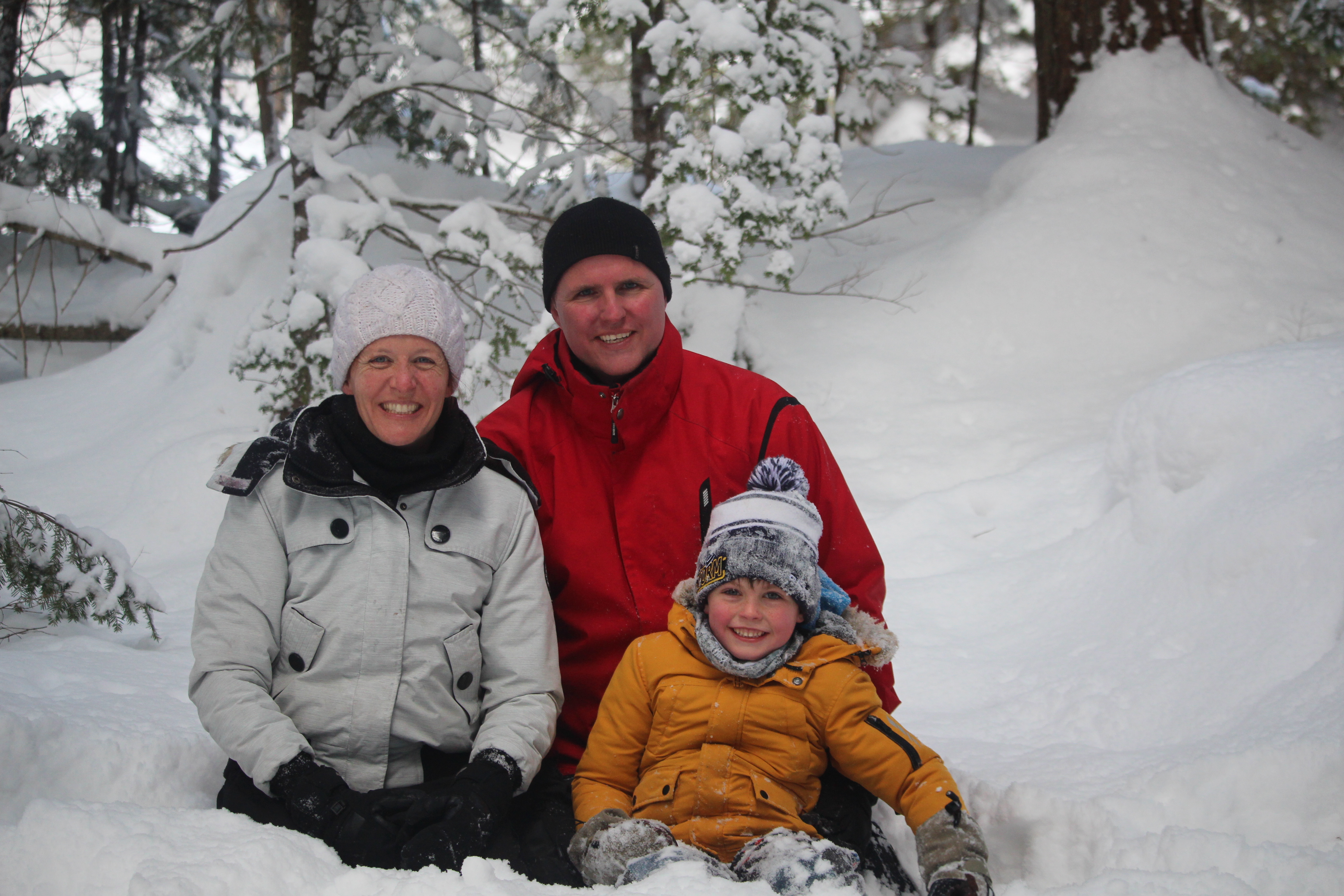 Family outside enjoying the snow
