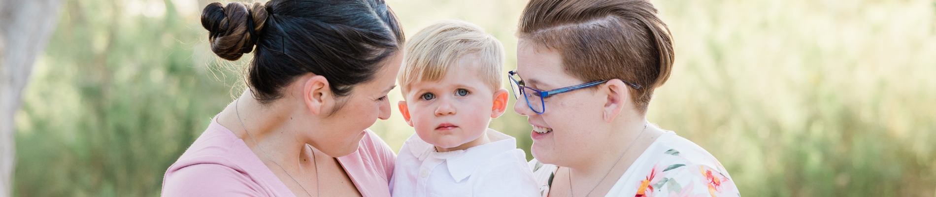 two moms with baby